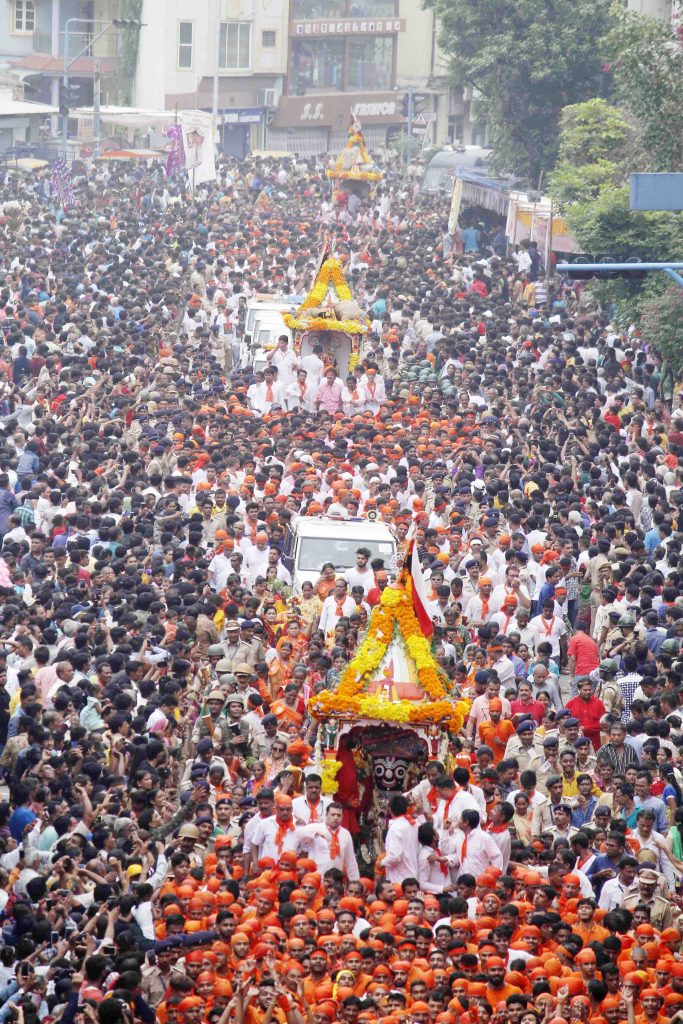 Gujarat CM Vijay Rupani and Dy CM Nitin Patel pull the chariot to mark the beginning of 141st Lord Jagannath Rath Yatra in Ahmedabad on Saturday